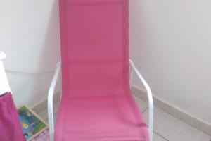 Fauteuil bascule rose