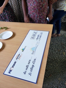 1-repas-enfant-proman-offre-cheque-10000-euros-village-eva-distribuer-42000-repas