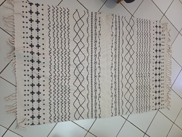 Vend tapis blanc